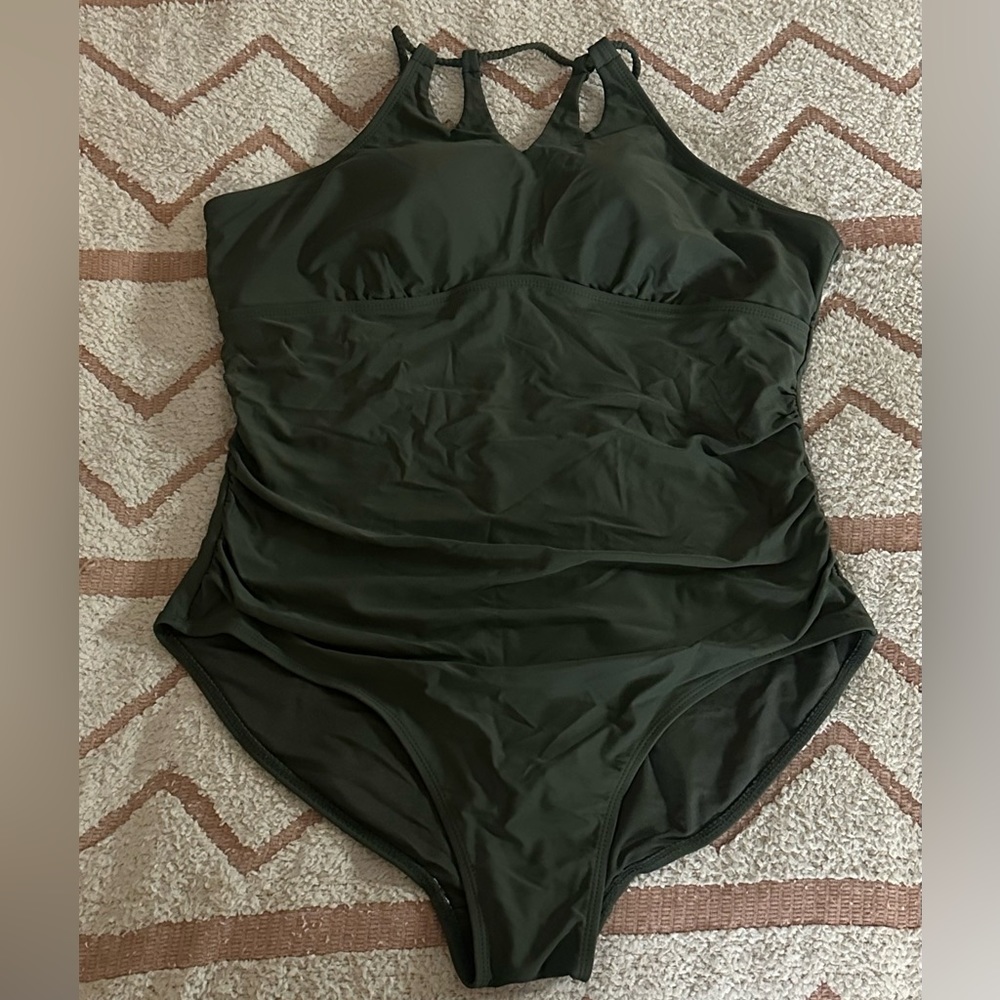 One piece, olive green swim suit. Size 14.